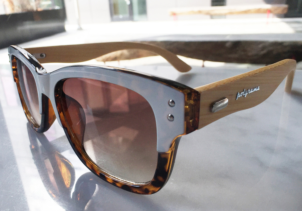 bamboo wayfarer sunglasses tortoise on table